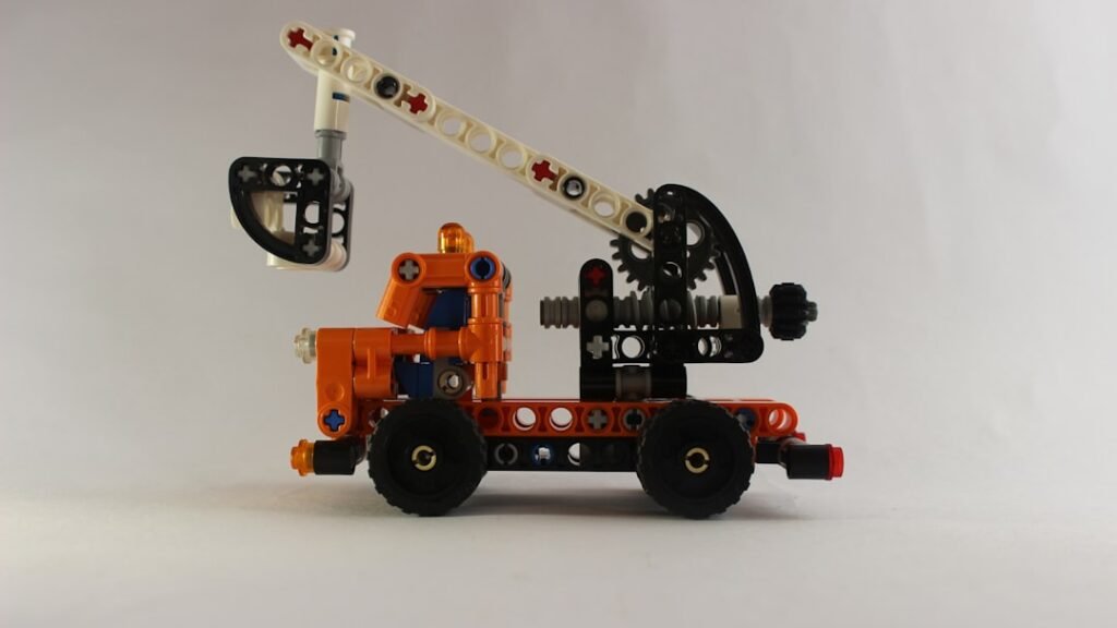 découvrez notre mini grue à chenilles compacte et puissante, idéale pour les espaces restreints et les travaux de levage précis.